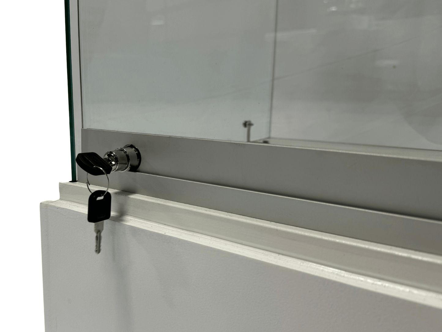 GLASS DISPLAY CASE - H 38" / W 48" / D 18" LLL's Glass Display Case is a locking low profile enclosed glass case with modular shelves. This piece is great for clients who want to safely display specific items without risking damage. The case has a neat, c
