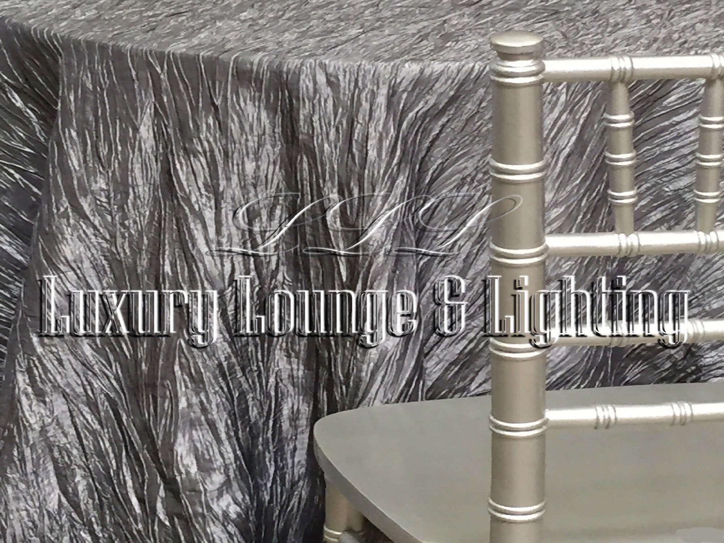 CRINKLE TAFFETA LINEN - CHARCOAL - 132" Diameter LLL's Crinkle Taffeta Linen in Charcoal is a round crinkle taffeta linen designed to add a rich metallic grey to your event decor.