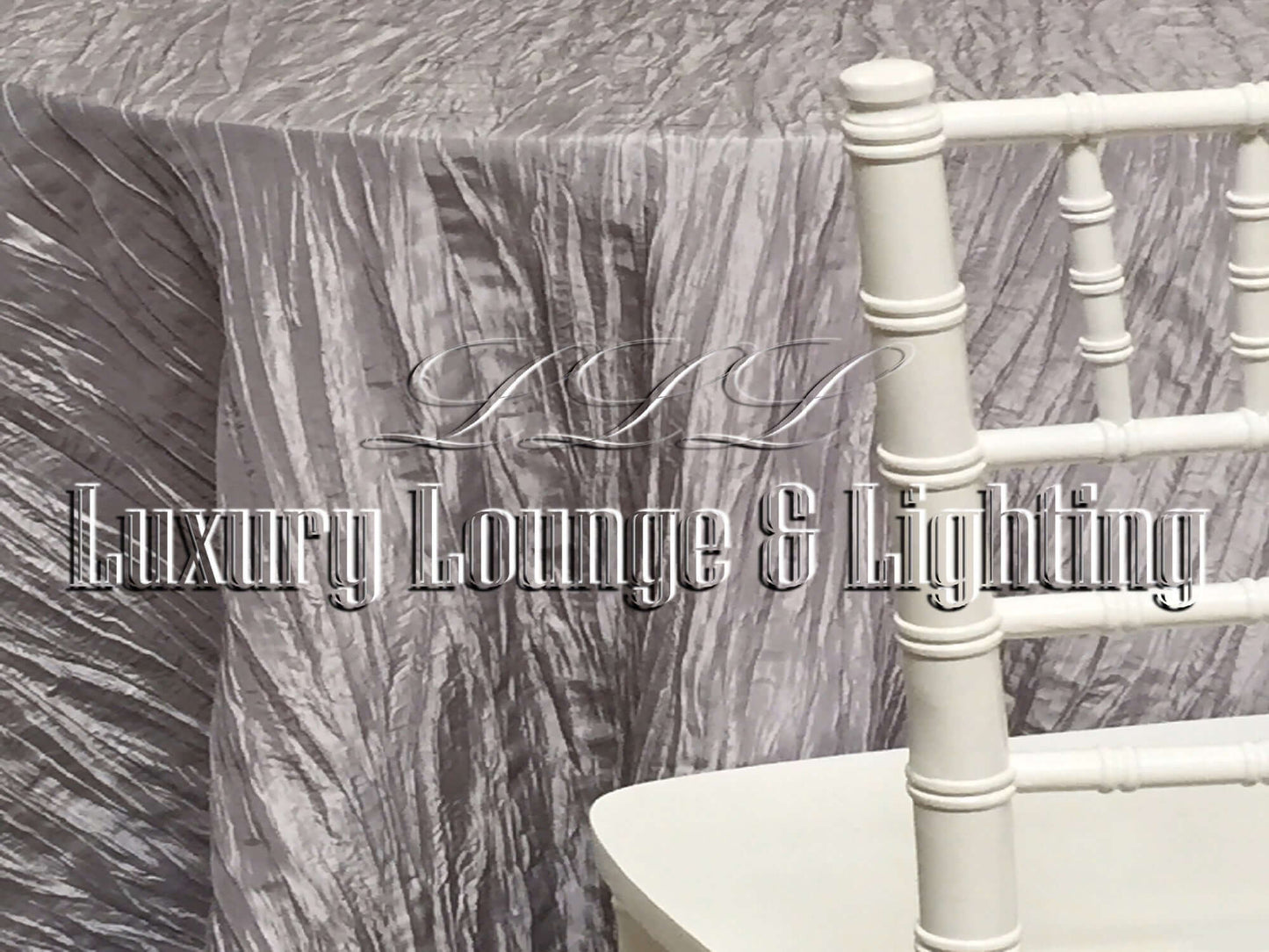 CRINKLE TAFFETA LINEN - SILVER - 132" Diameter LLL's Crinkle Taffeta Linen in Silver is a round crinkle taffeta linen designed to add a touch of light metallic grey to your event decor.