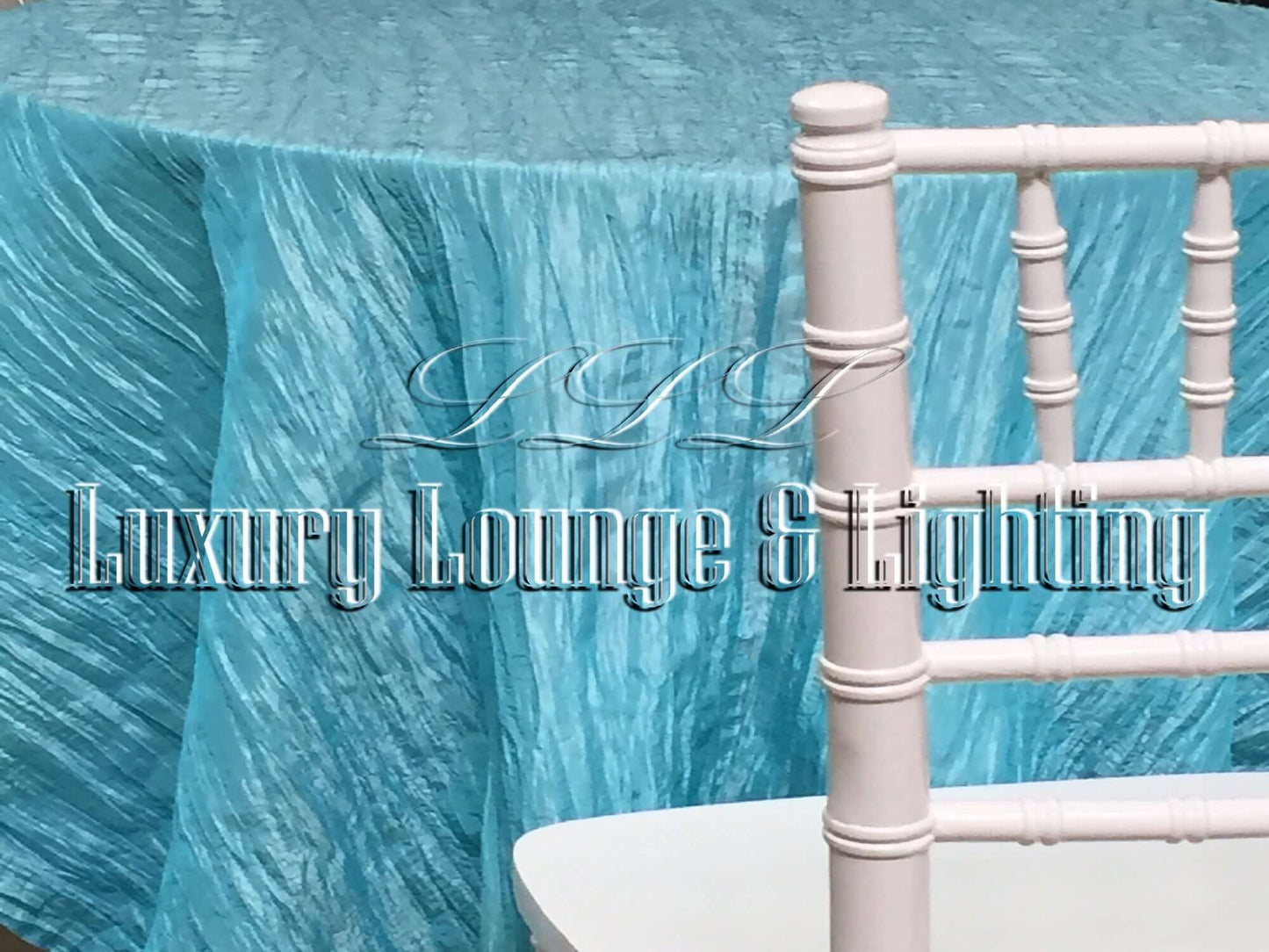 CRINKLE TAFFETA LINEN - TURQUOISE 2 - 132" Diameter LLL's Crinkle Taffeta Linen in Turquoise 2 is a round crinkle taffeta linen designed to add light blue turquoise accents to your event decor.