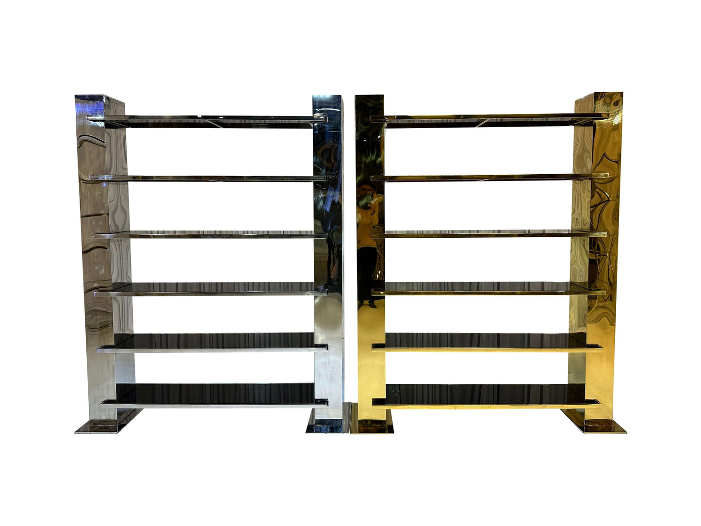 CAYMUS DISPLAY UNIT - SILVER - H 92" / W 75.5" / D 20" | Shelf Height 14.25" The LLL Caymus Display Unit in Silver is sure to make heads turn! This modern-yet-classic display unit features a stunning gold metal with black glass shelving. This piece can be