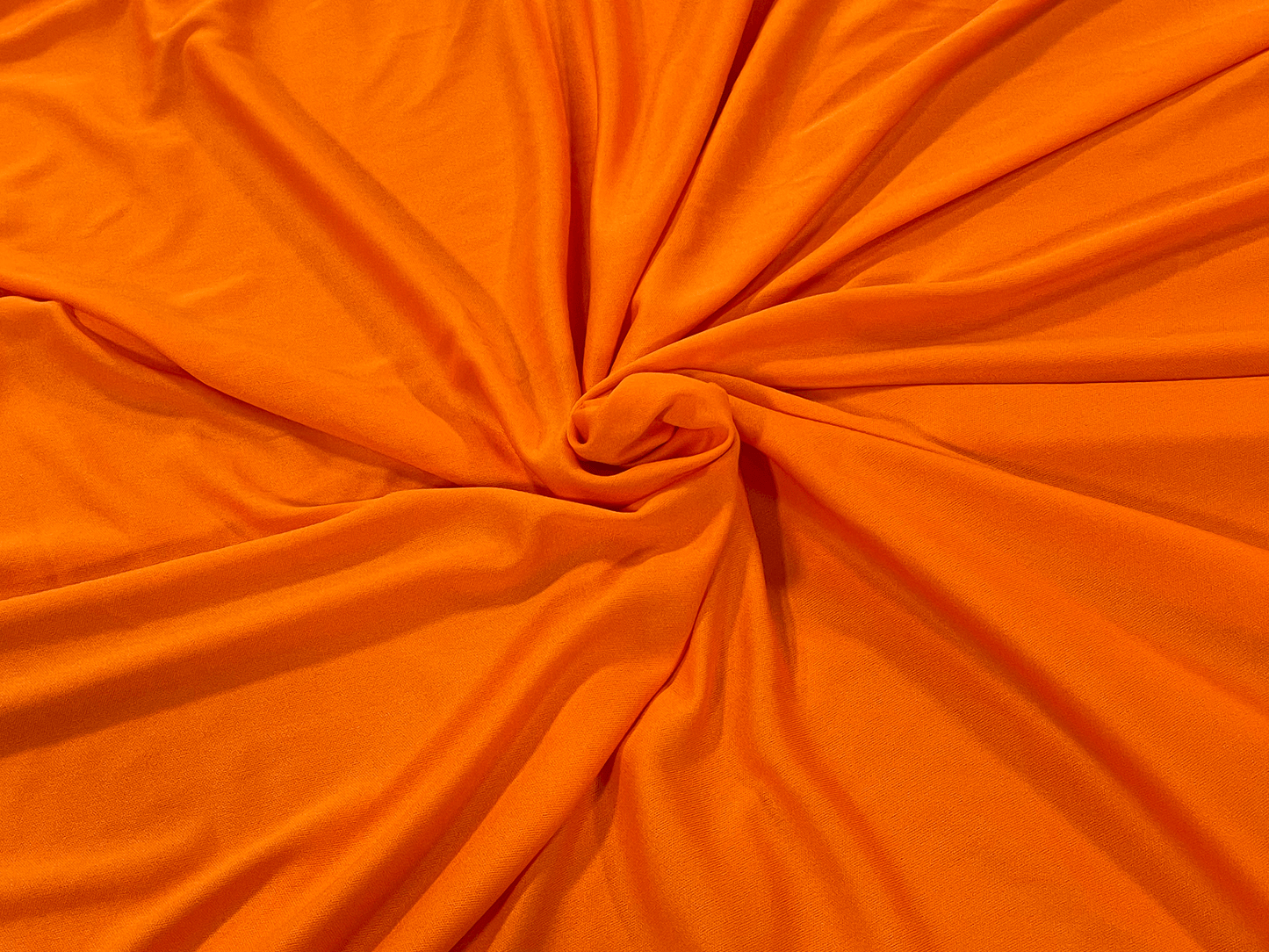 LITE L'AMOUR DRAPE - ORANGE - H 20' / W 108" LLL's L'amour Drape - Orange. This orange has a unique drapery effect that gives your look a sophisticated edge. Perfect for any formal event or occasion, you'll look timeless with this stunning orange.