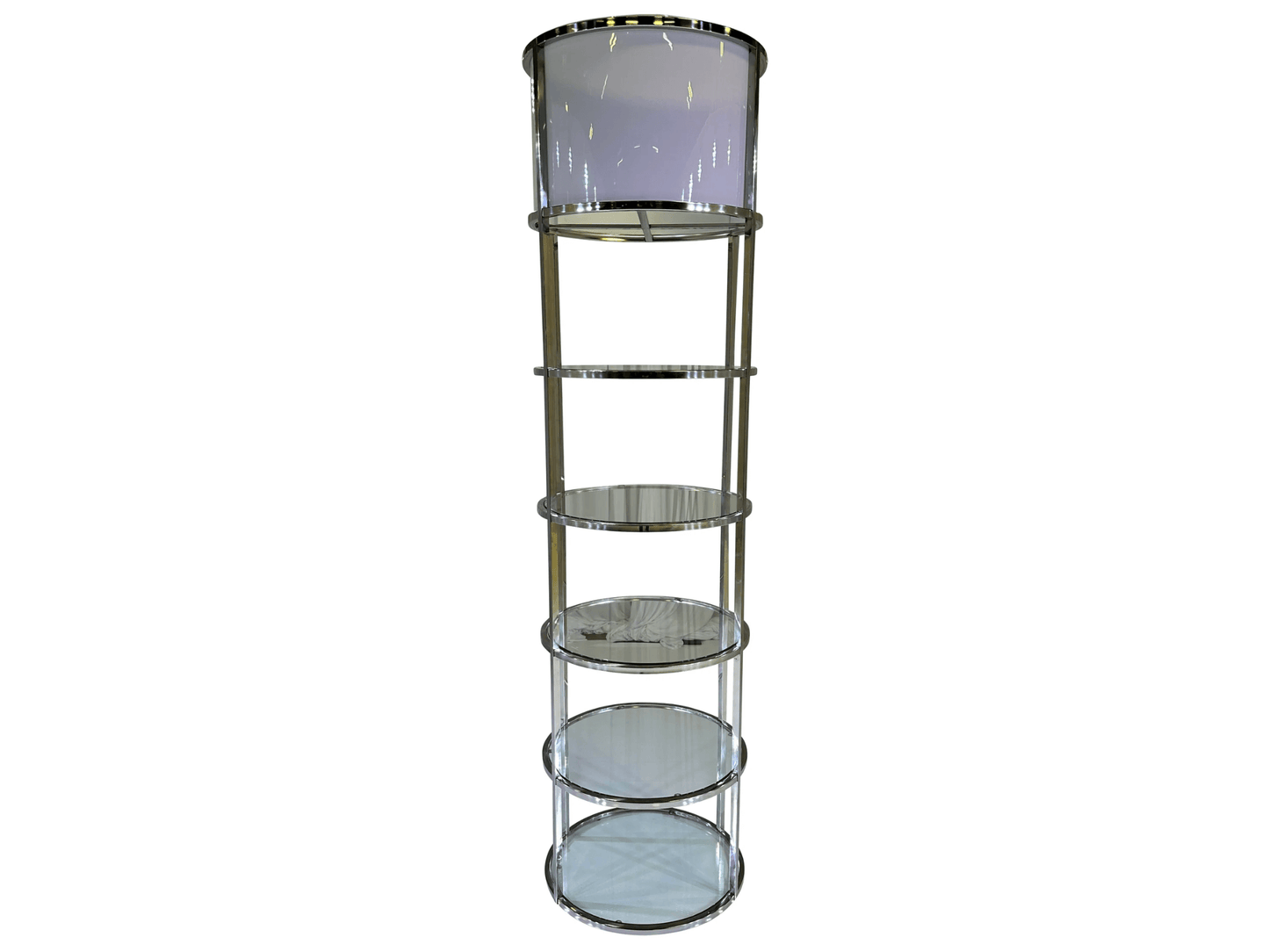RESERVE DISPLAY UNIT - SILVER - H 88" / D 24" | H (Shelf) 14" LLL Reserve Display Unit in silver is a multi-tiered shelving solution designed to showcase your items. Featuring a sleek, cylindrical design with silver frames and clear glass shelves, this un