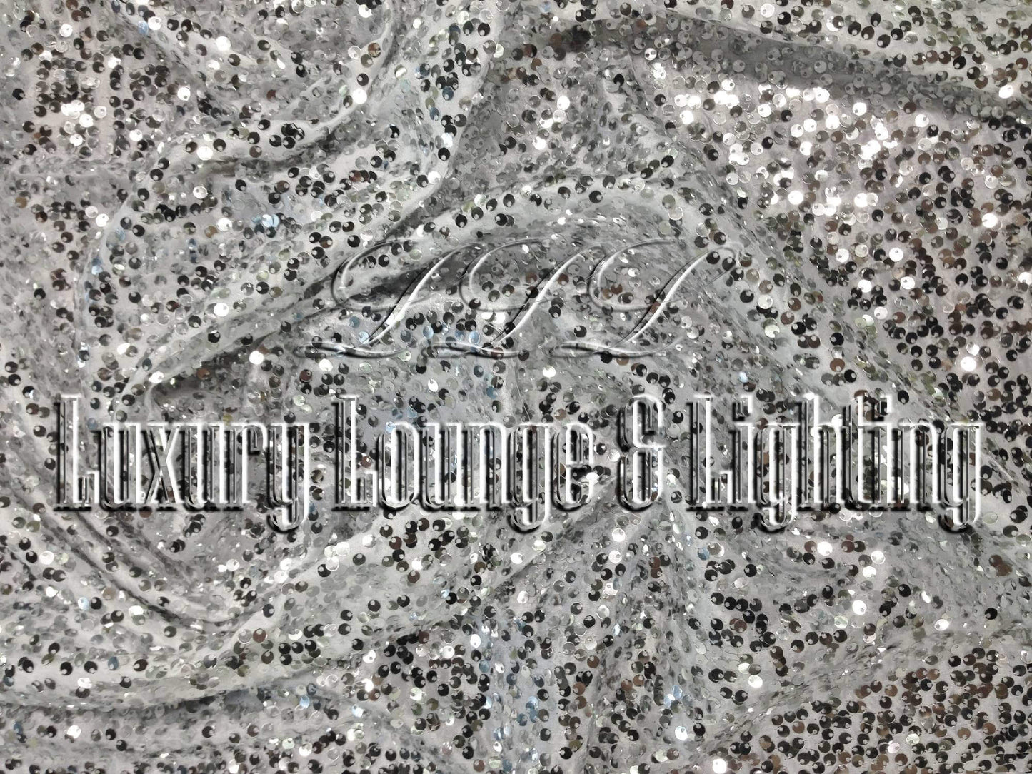 SEQUIN LINEN - SILVER - Diameter 132" LLL's Sequin Linen in Silver is a light grey taffeta linen with bright silver sparkle sequin paillettes. This silver sequin linen is perfect for adding additional sparkle at black tie events or highlighting a sweethea