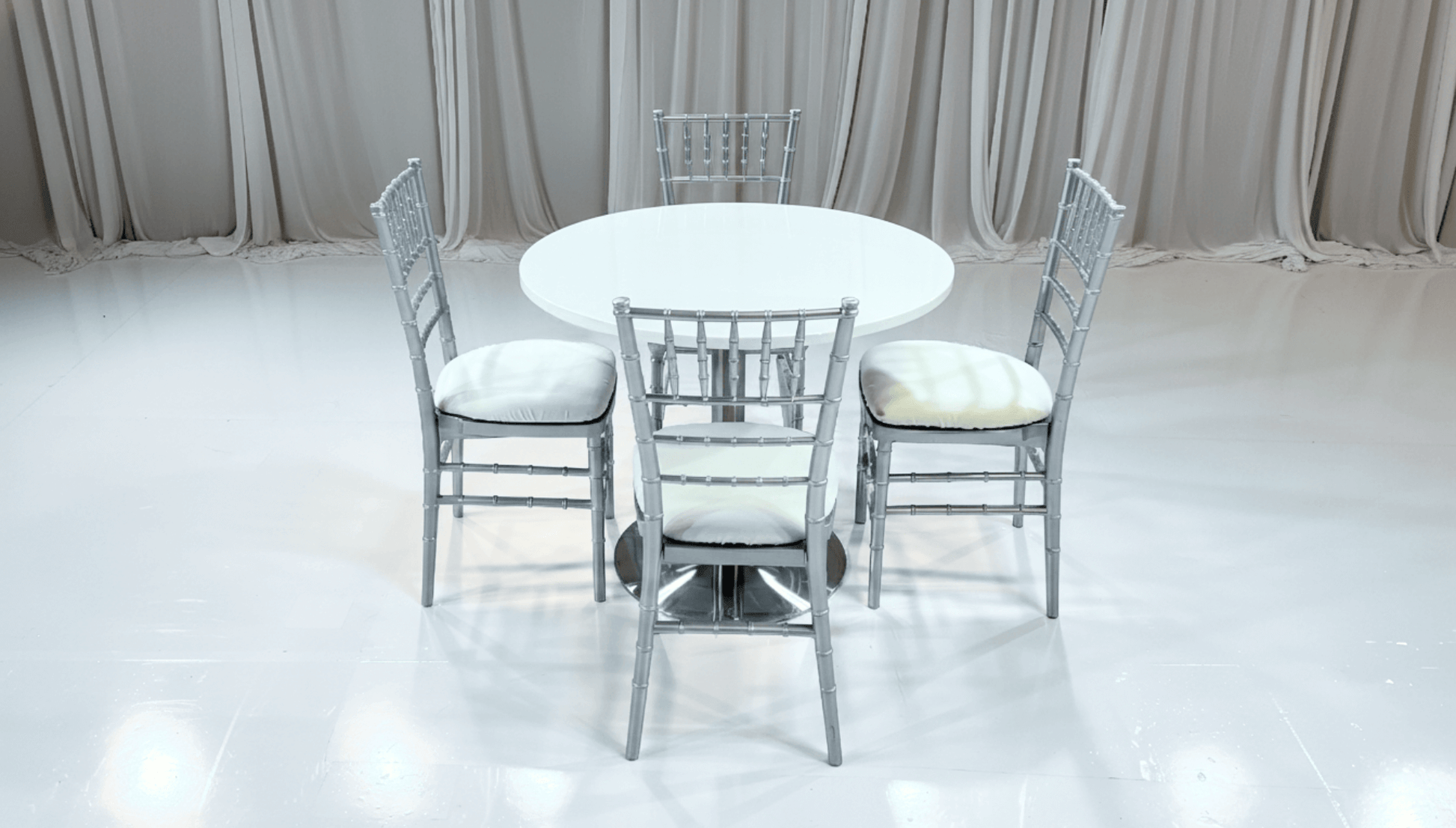 PARIS COCKTAIL GROUPING 1 - Featured Items in this grouping include: Paris Cocktail Lowboy Table Chiavari Chair - Silver