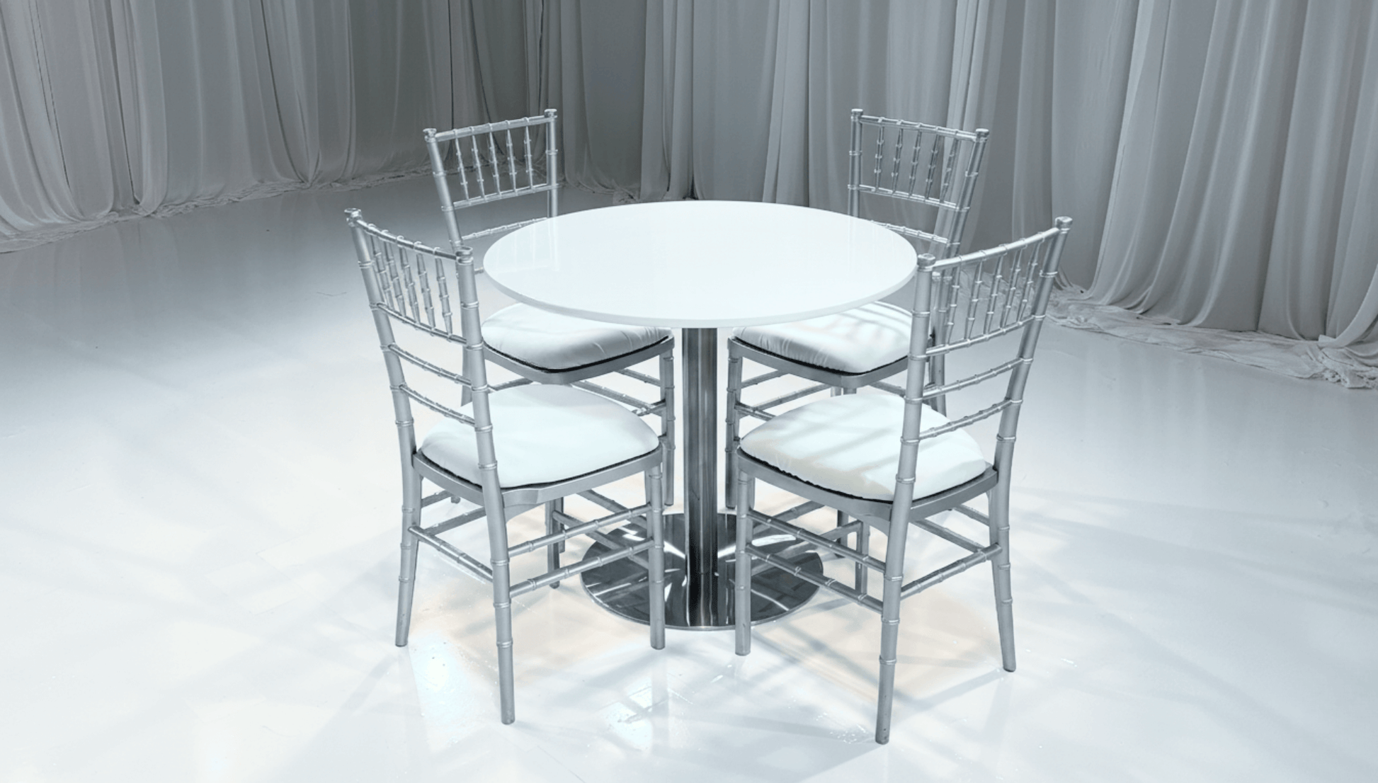 PARIS COCKTAIL GROUPING 1 - Featured Items in this grouping include: Paris Cocktail Lowboy Table Chiavari Chair - Silver