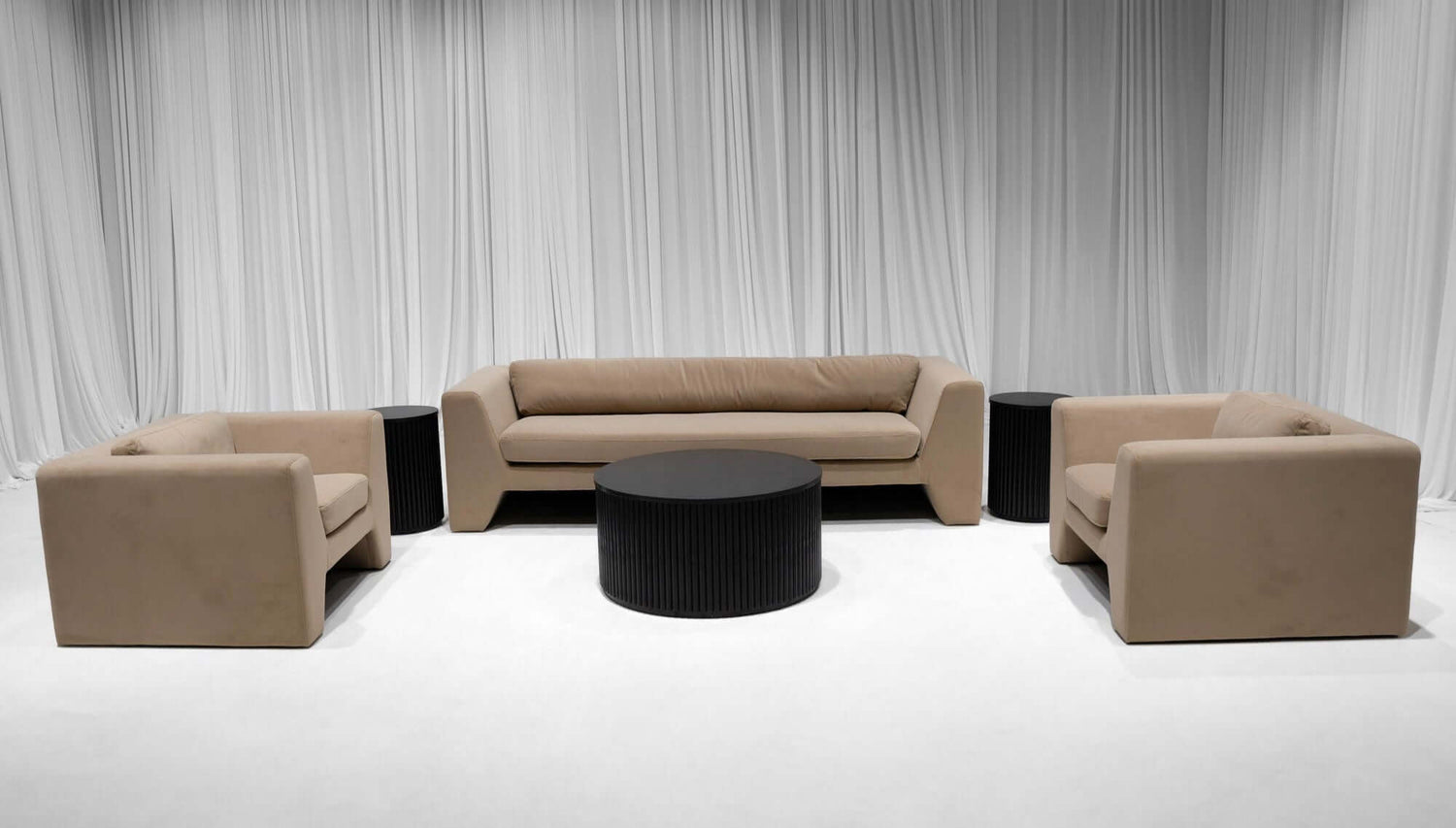 ZELDA SOFA GROUPING 2 - CAMEL - Featured Items in this grouping include: Zelda Sofa - Camel Zelda Armchair - Camel Fairmont Fluted Coffee Table - Black Wood Fairmont Fluted Accent Table - Black Wood